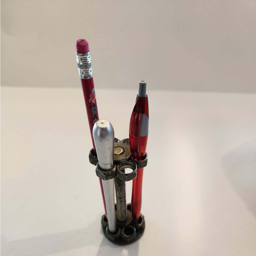 Metal art made by veteran that’s disabled pen holder 2x5x3 weighs 1lb